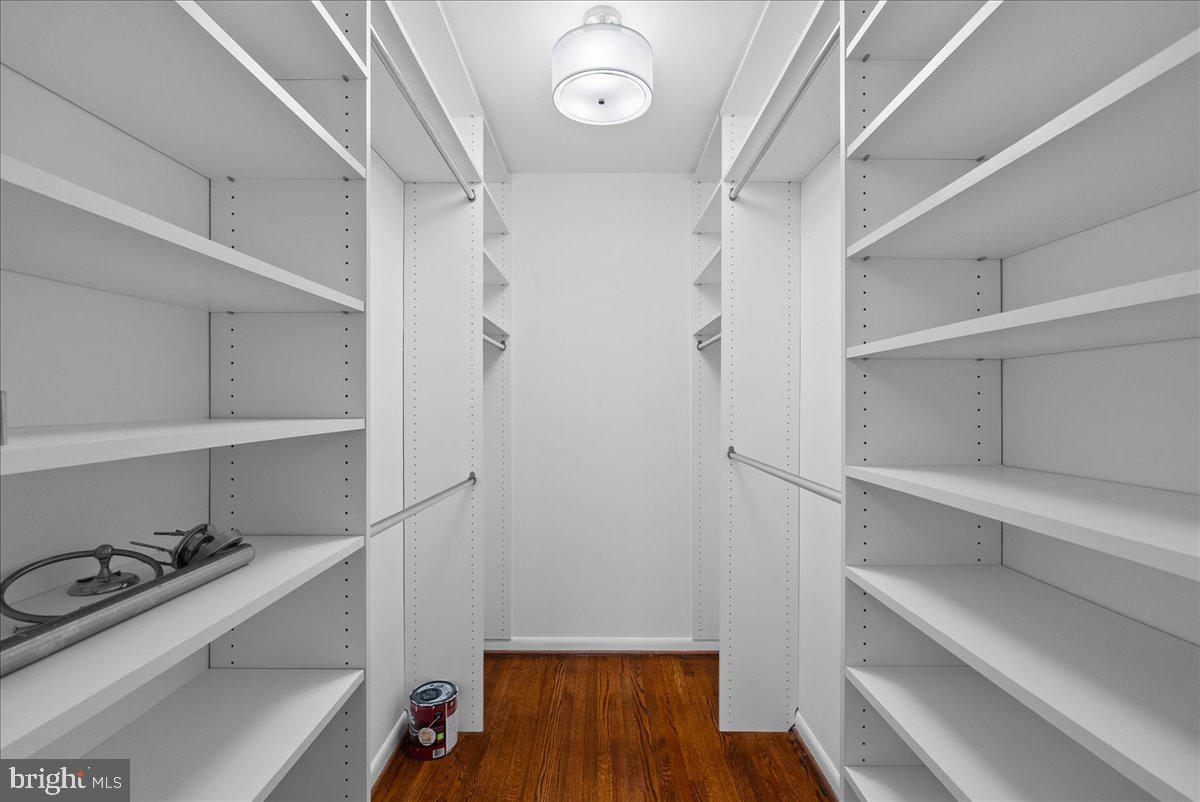 7845 Brompton Street Springfield, VA 22152 - Photo 15 of 32 a view of walk in closet with empty racks