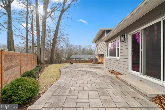 a view of a backyard of the house