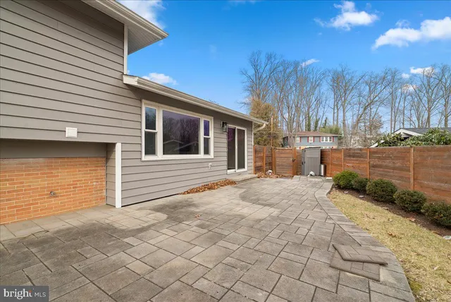 a view of a backyard of the house