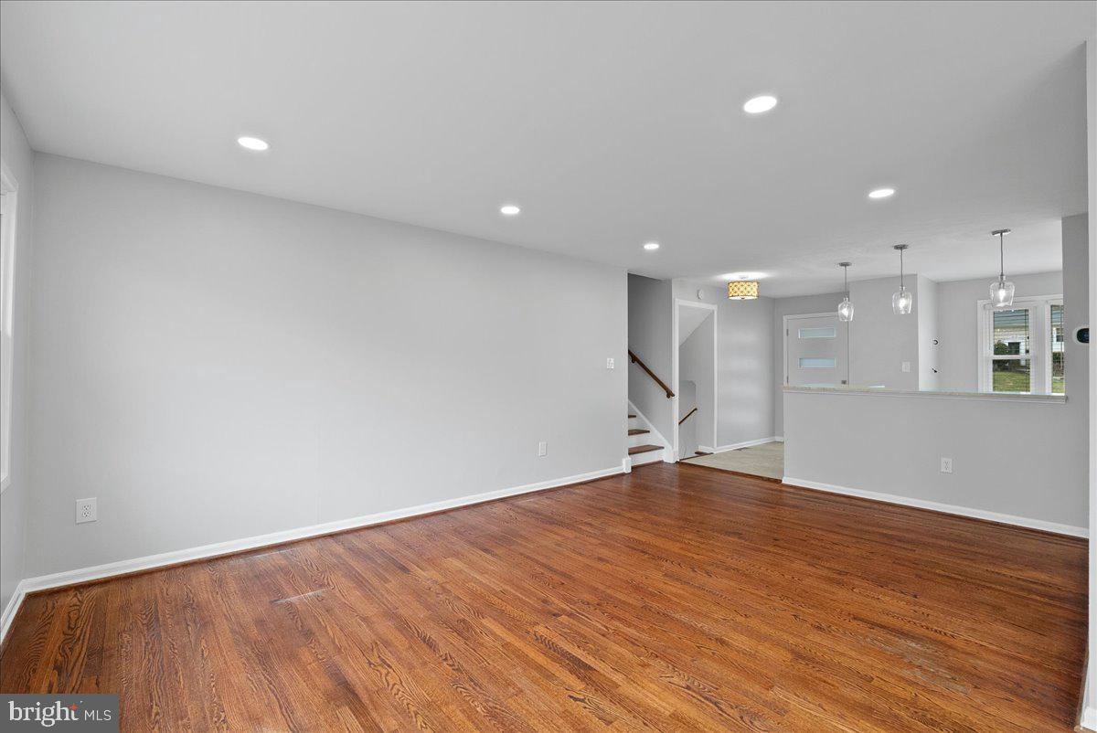 7845 Brompton Street Springfield, VA 22152 - Photo 5 of 32 a view of an empty room with wooden floor