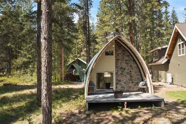 a bathroom with a toilet a sink and a window