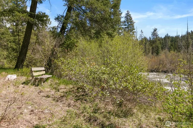 a backyard of a house with lots of green space