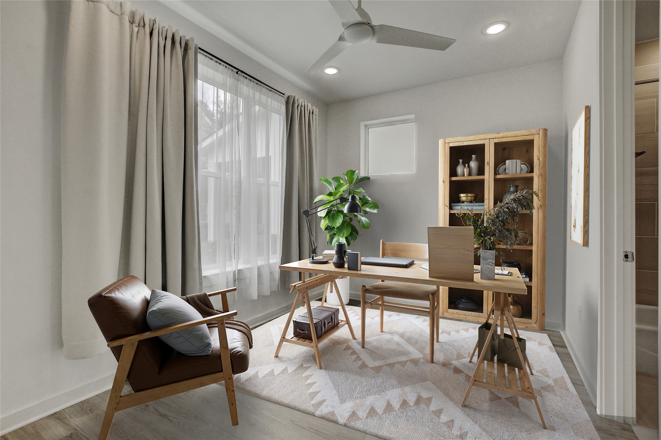 2624 Metcalfe Road, Unit 17 Austin, TX 78741 - Photo 4 of 35 a workspace with furniture and window