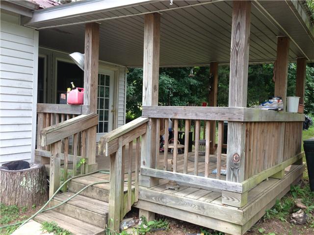 66 Reed Hollow Road Petersburg, TN 37144 - Photo 3 of 19 Nice side covered porch for outdoor entertainment or just to watch the sun set!