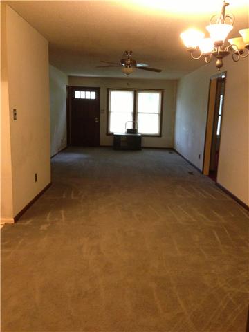 66 Reed Hollow Road Petersburg, TN 37144 - Photo 5 of 19 Living room is carpeted but has hardwood flooring underneath, add your decorating touches and call this HOME!
