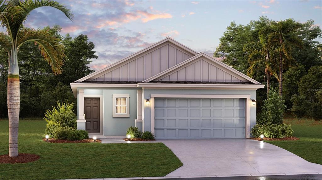 637 Reggie Road Winter Haven, FL 33859 - Photo 1 of 1 a front view of a house with a garden and garage