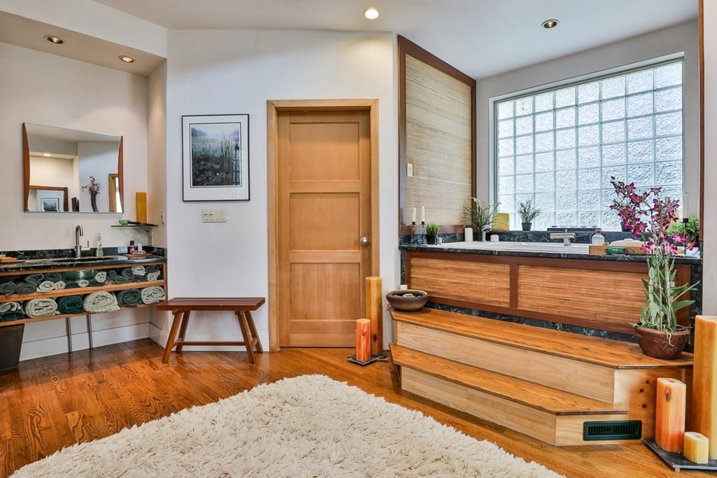74 Woodside Road Harvard, MA 01451 - Photo 20 of 42 a living room with furniture and a table