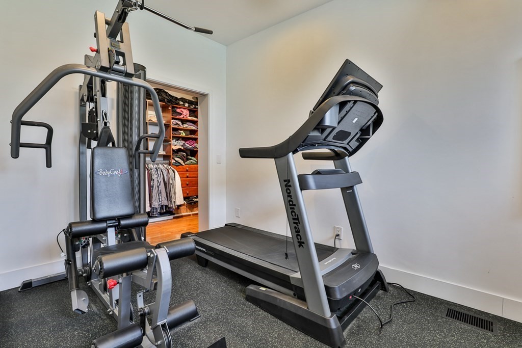 74 Woodside Road Harvard, MA 01451 - Photo 23 of 42 a room with gym equipment