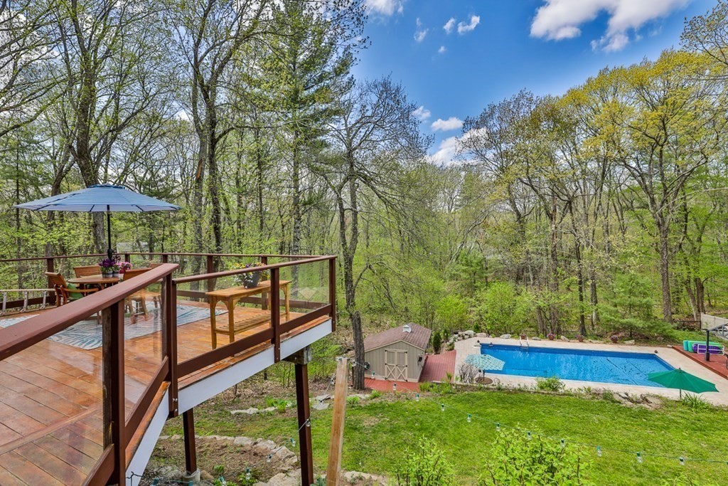 74 Woodside Road Harvard, MA 01451 - Photo 38 of 42 a view of a wooden deck with furniture