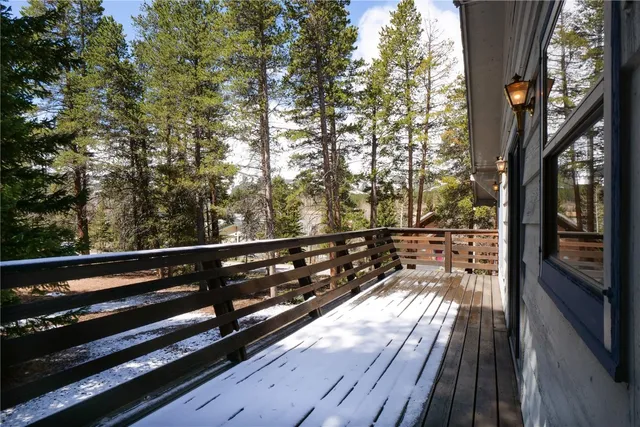 a view of balcony with wooden floor