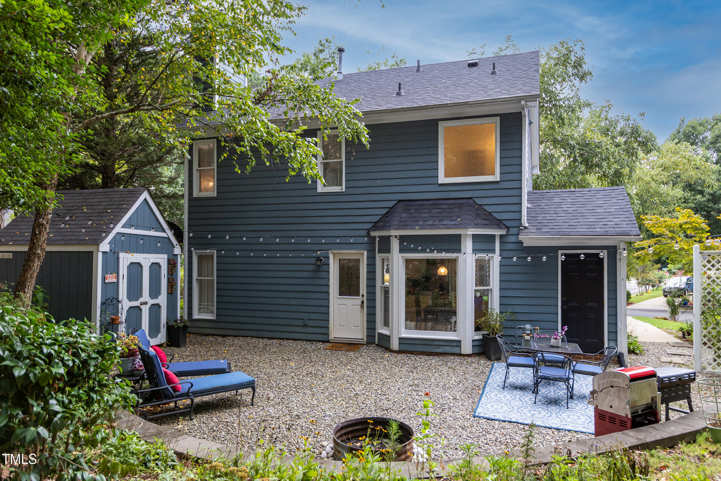 12116 Queensbridge Court Raleigh, NC 27613 - Photo 13 of 16 a front view of a house with entertaining space
