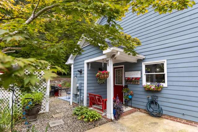 a view of a chairs in front of house