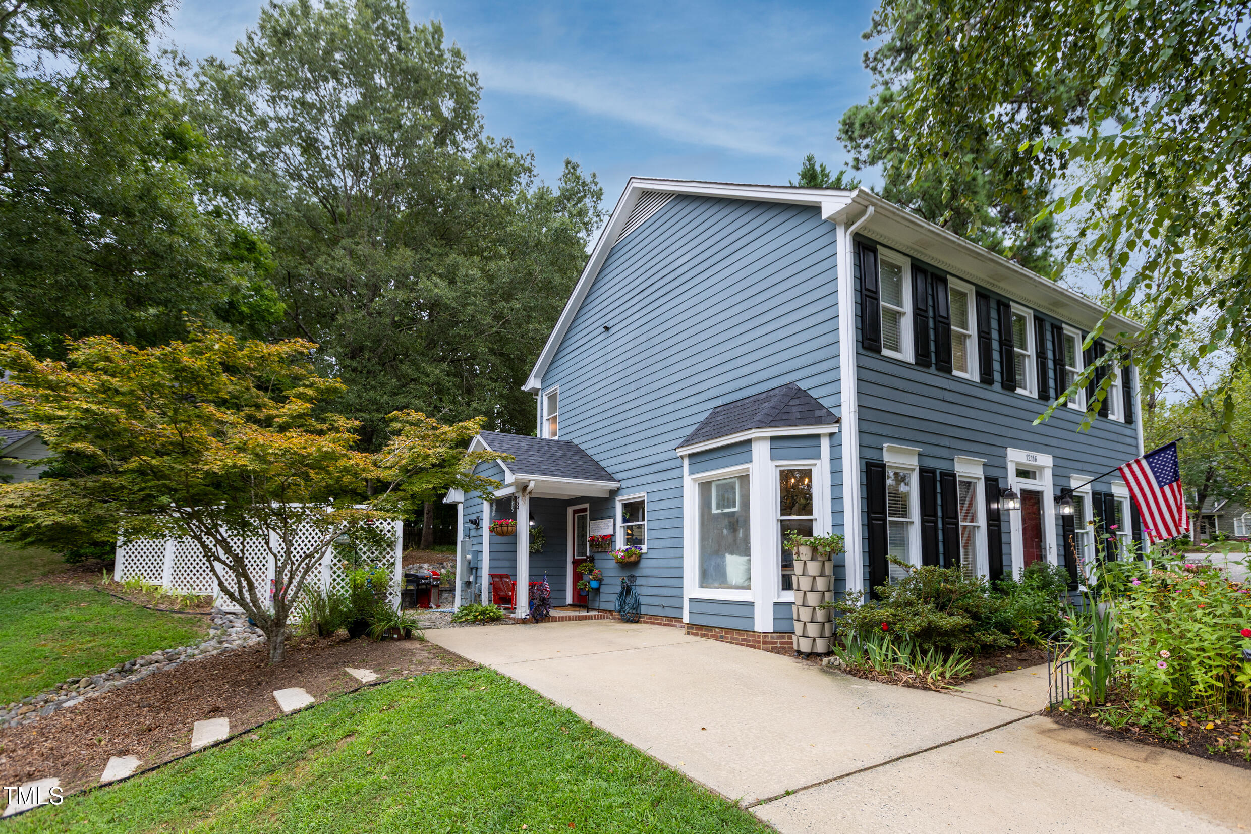 12116 Queensbridge Court Raleigh, NC 27613 - Photo 16 of 16 front view of a house with a yard