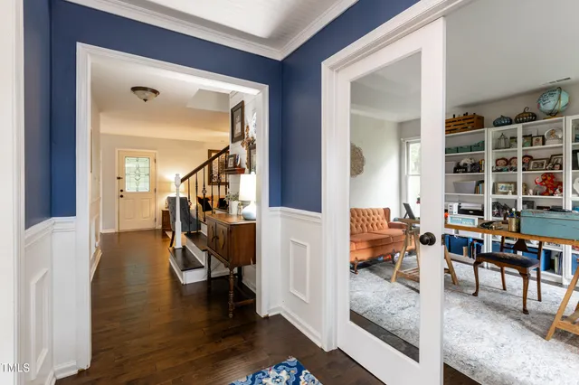 a view of living room and dining room