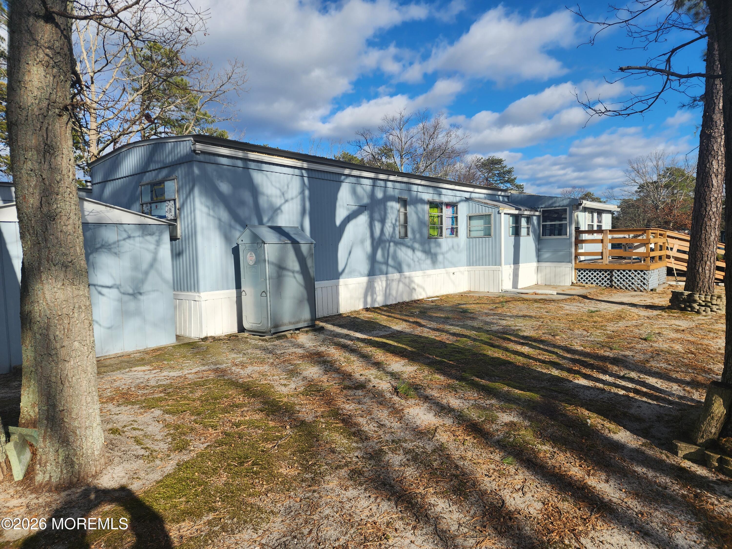 6 Ermine Court Whiting, NJ 08759 - Photo 4 of 9 a view of a house with a snow on the road
