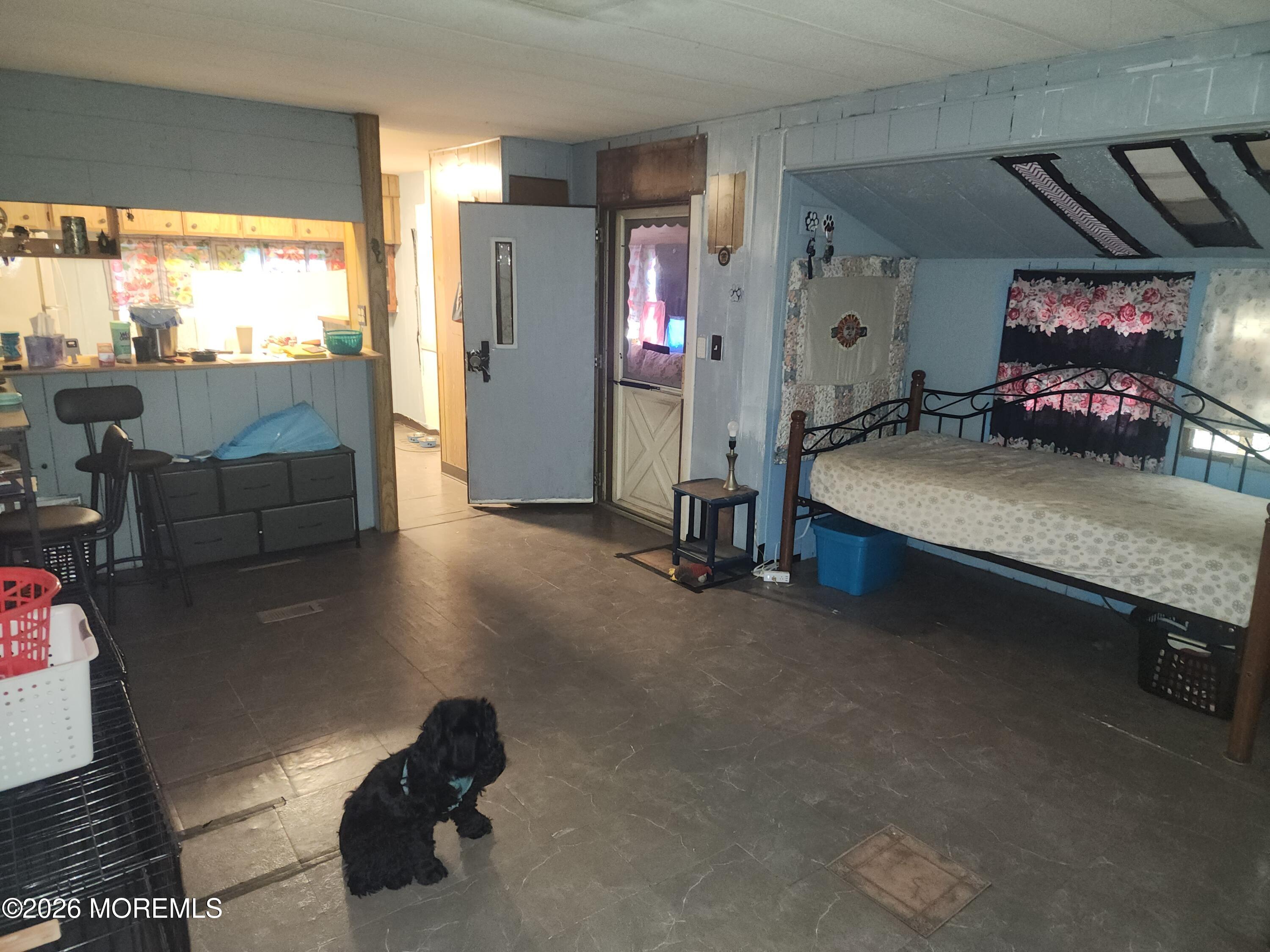 6 Ermine Court Whiting, NJ 08759 - Photo 8 of 9 a room with furniture and a large window