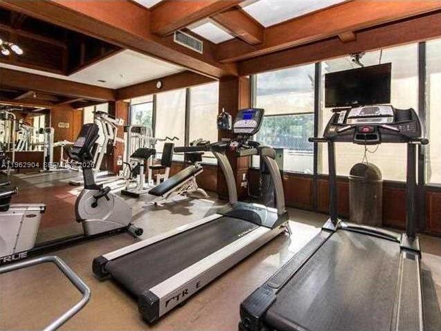 600 Northeast 36th Street, Unit 507 Miami, FL 33137 - Photo 20 of 23 a view of a room with gym equipment