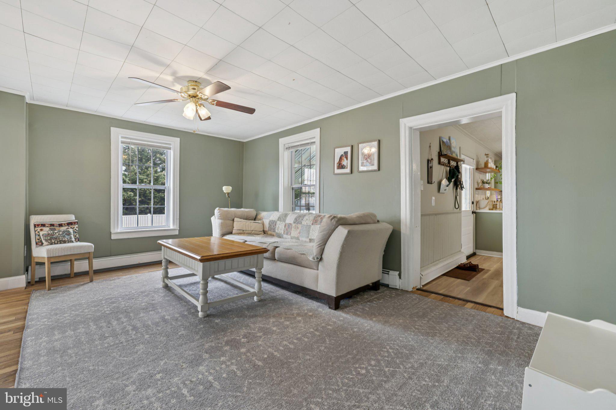 22538 Old Georgetown Road Smithsburg, MD 21783 - Photo 11 of 50 a living room with furniture