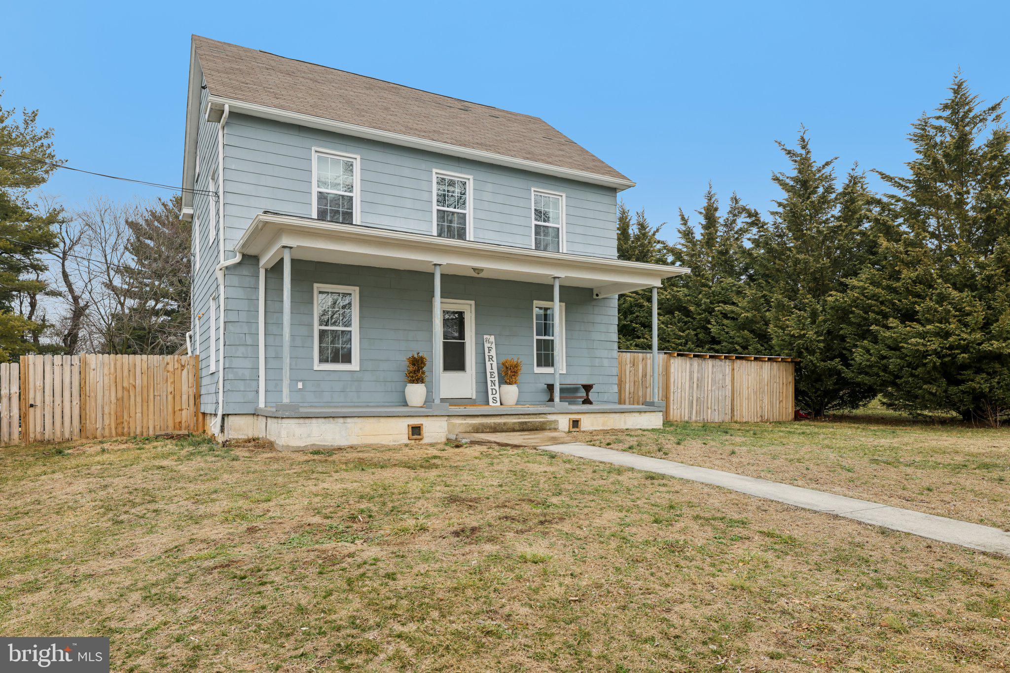 22538 Old Georgetown Road Smithsburg, MD 21783 - Photo 2 of 50 a front view of a house with a yard
