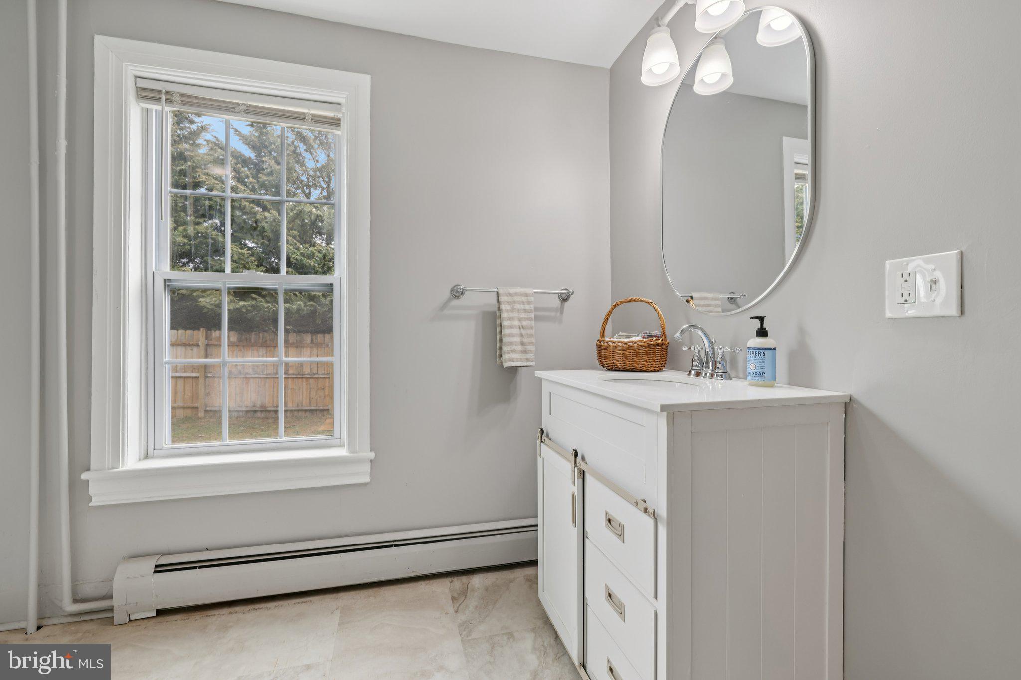 22538 Old Georgetown Road Smithsburg, MD 21783 - Photo 21 of 50 a room with a mirror and a fan