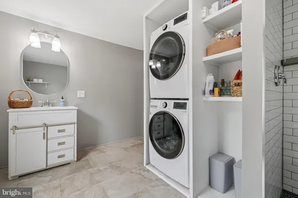 a utility room with dryer and washer