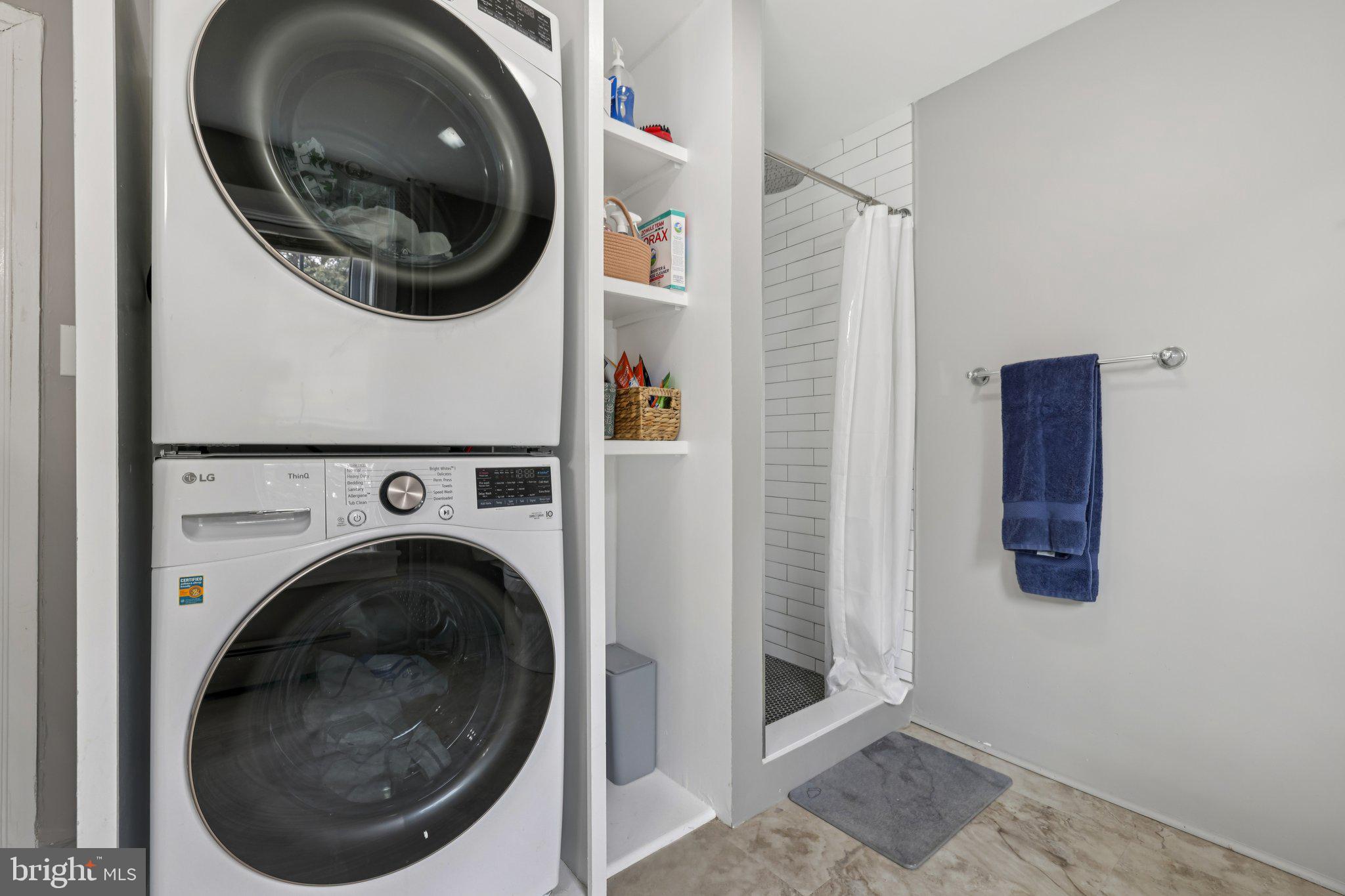 22538 Old Georgetown Road Smithsburg, MD 21783 - Photo 23 of 50 a view of a hallway with washer and dryer