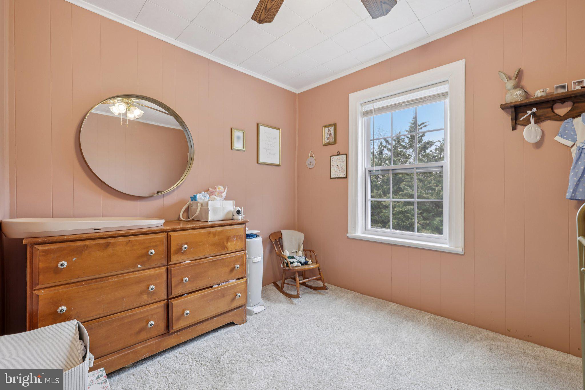22538 Old Georgetown Road Smithsburg, MD 21783 - Photo 36 of 50 a room with a dresser and a mirror