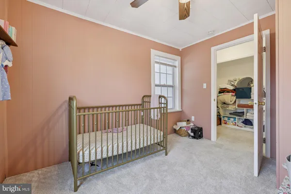 a room with furniture and a mirror