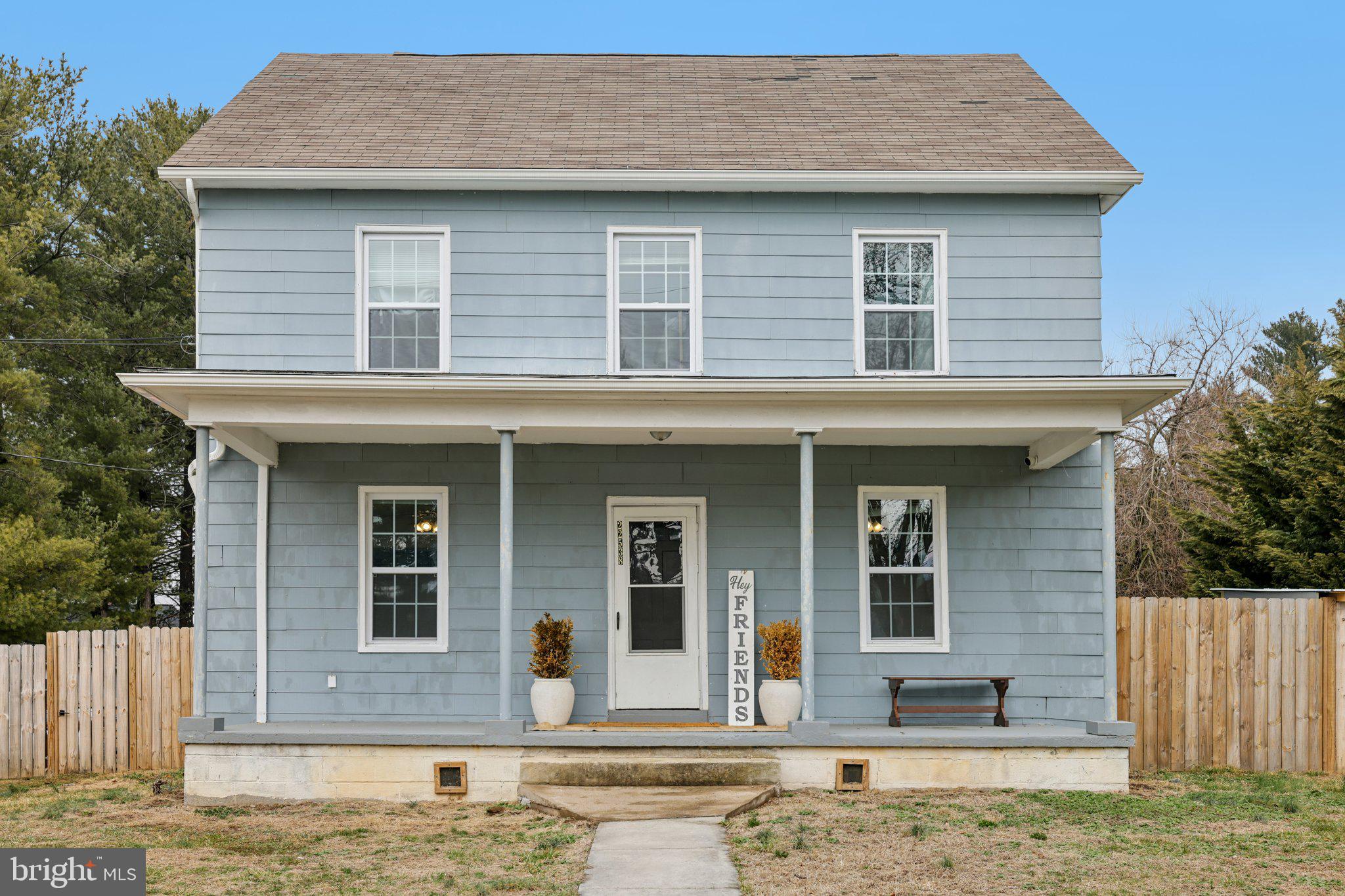 22538 Old Georgetown Road Smithsburg, MD 21783 - Photo 5 of 50 a front view of a house with a yard