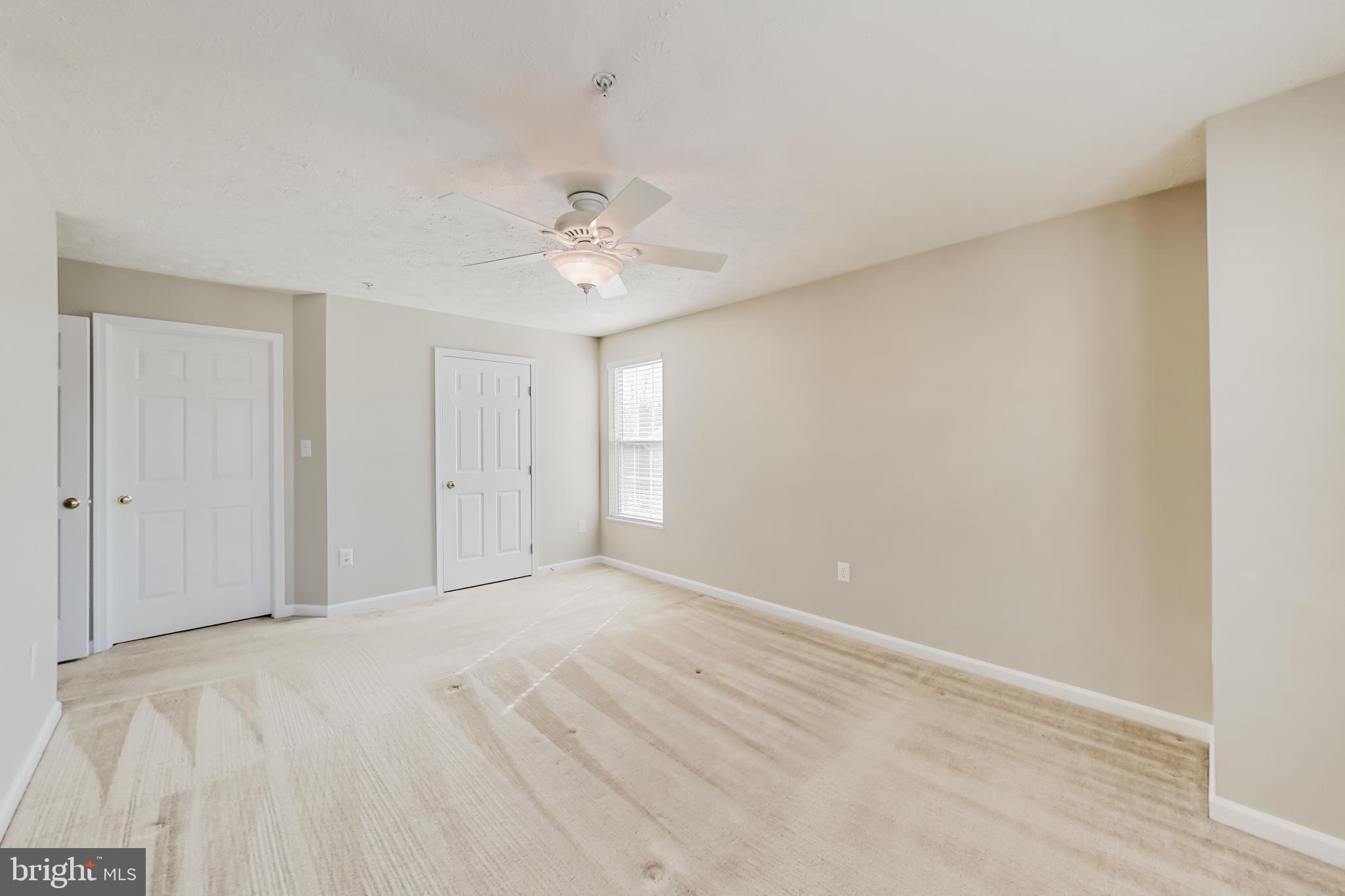 687 Winding Stream Way, Unit 304 Odenton, MD 21113 - Photo 12 of 33 a view of an empty room