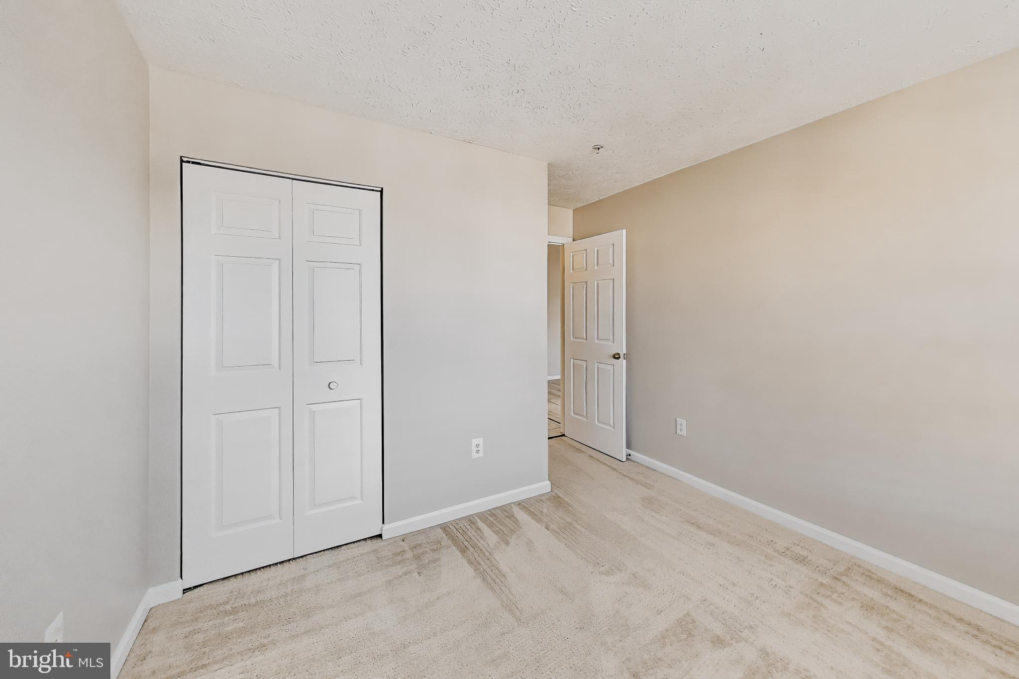 687 Winding Stream Way, Unit 304 Odenton, MD 21113 - Photo 16 of 33 a view of an empty room