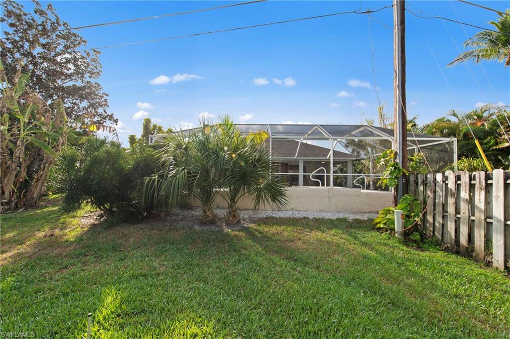 4724 Riverside Drive Estero, FL 33928 - Photo 35 of 44 a view of a house with a yard
