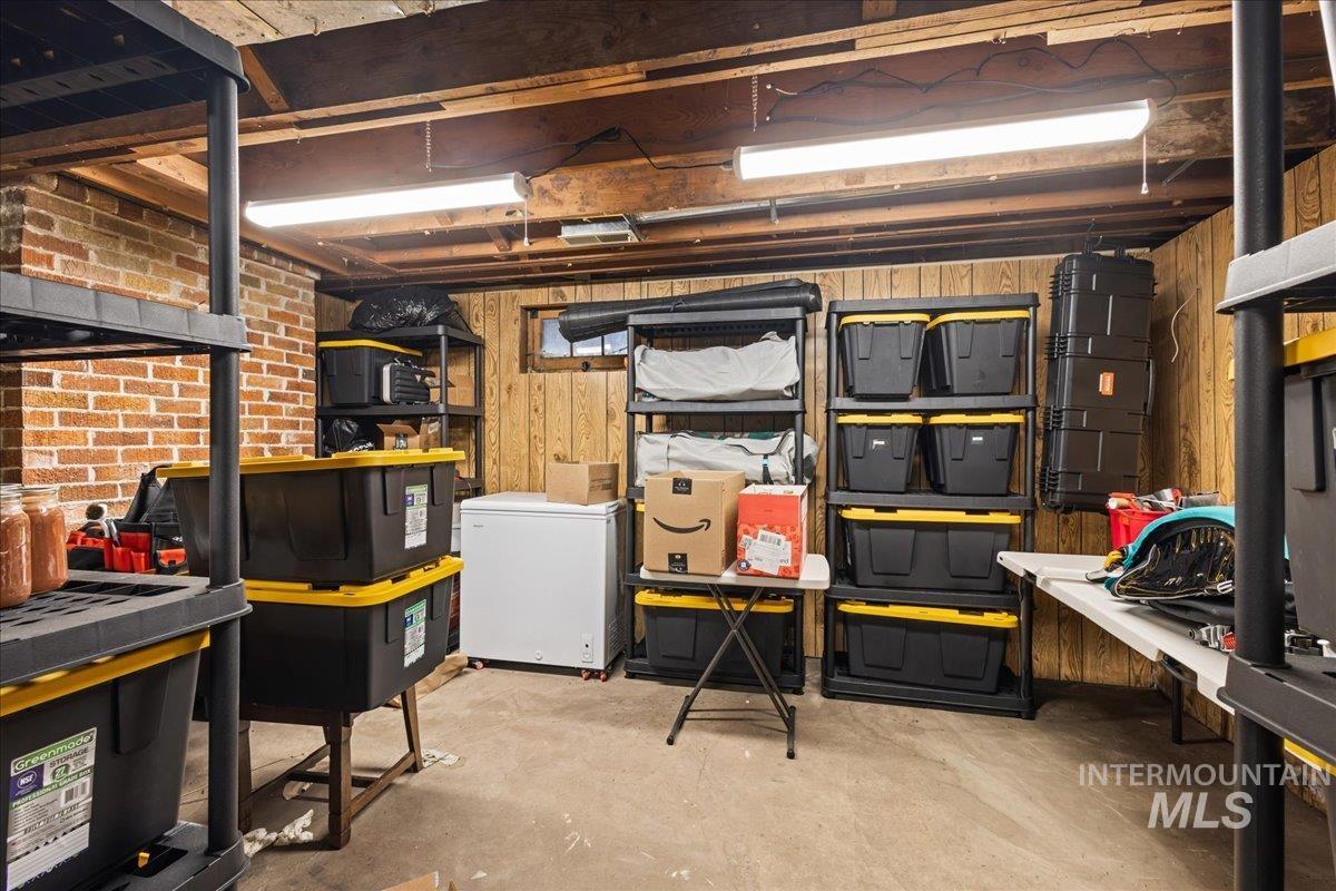 19454 Idaho Road Worley, ID 83876 - Photo 23 of 50 Below grade area with wood walls