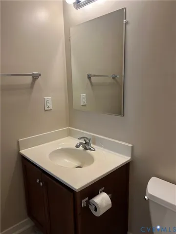 a bathroom with a sink and a toilet