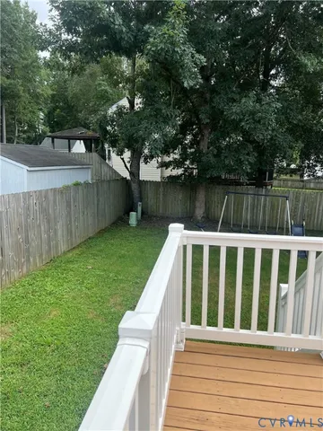a view of a backyard with a lake view