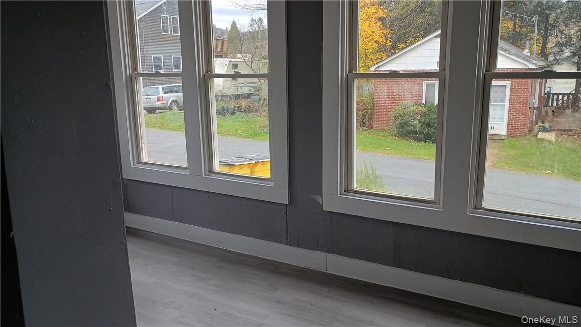 10 Church Avenue, Unit 7 Roscoe, NY 12776 - Photo 3 of 5 a view of an empty room with a window