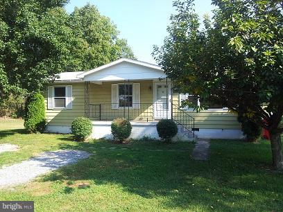 308 West 6th Avenue Ranson, WV 25438 - Photo 1 of 7 a front view of a house with a yard