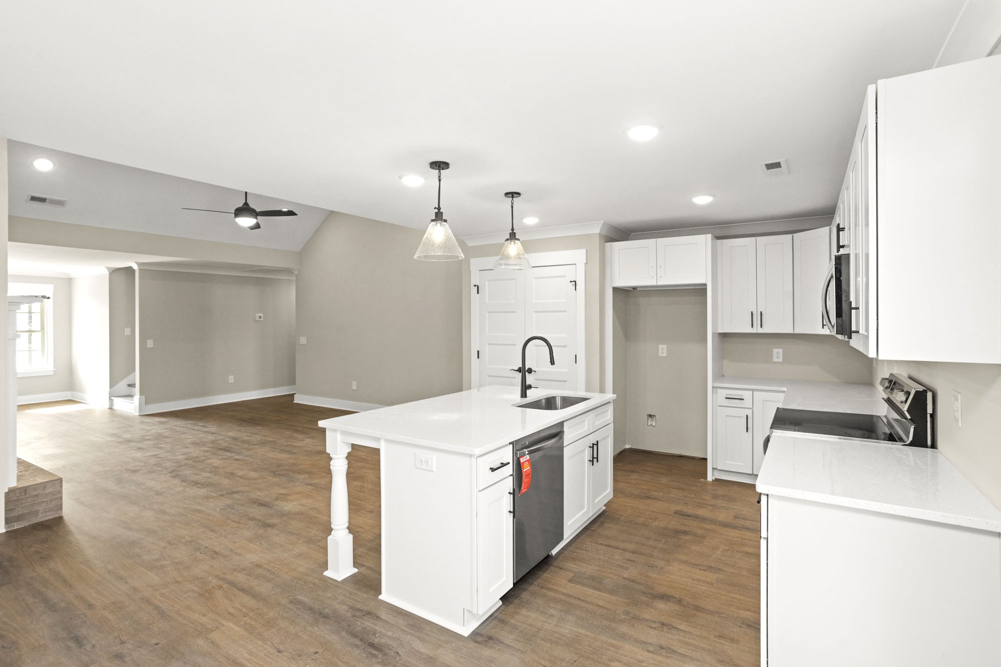 381 Copperas Creek Road Tullahoma, TN 37388 - Photo 12 of 44 a kitchen with a sink stove and refrigerator
