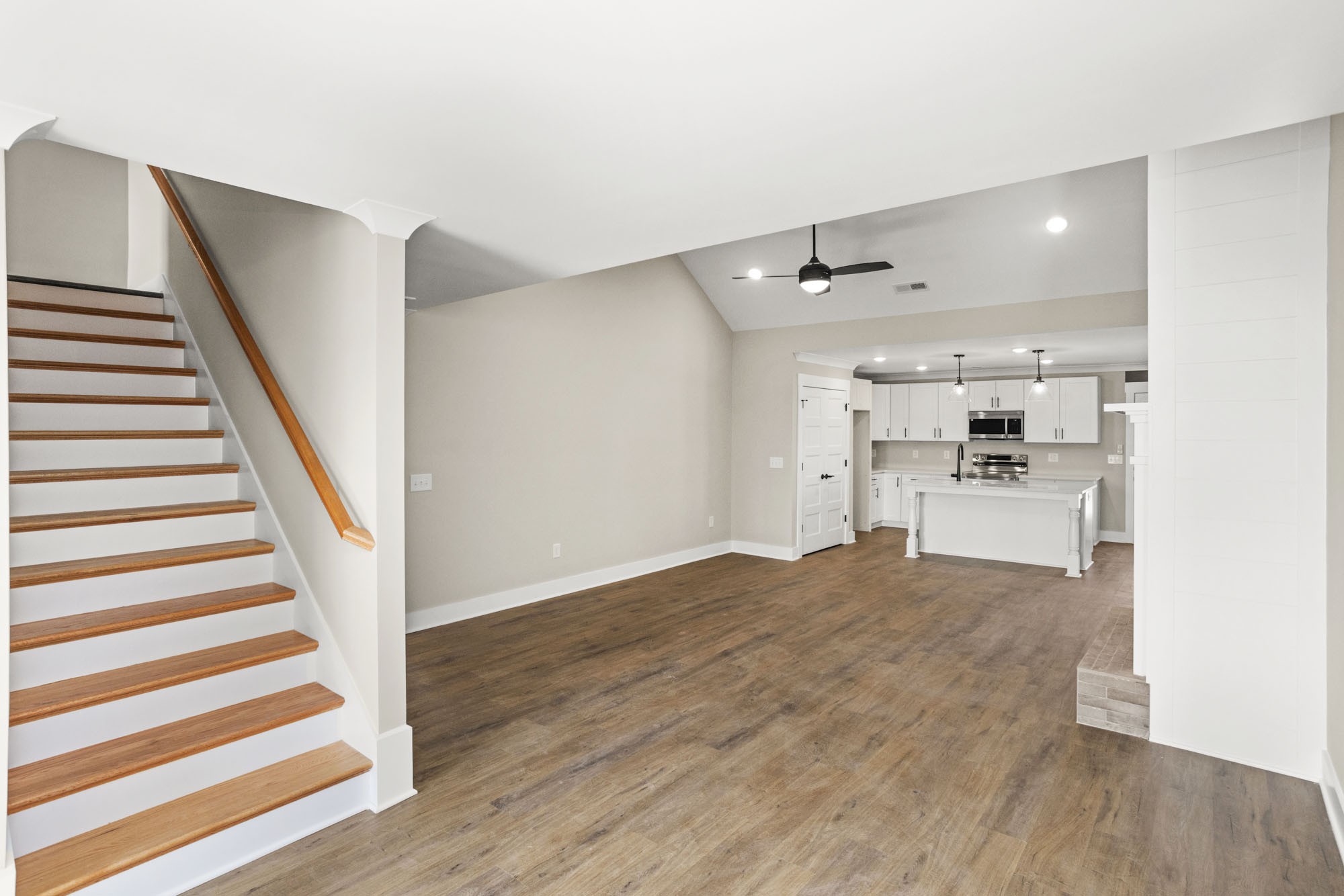381 Copperas Creek Road Tullahoma, TN 37388 - Photo 24 of 44 a view of a kitchen with wooden floor and electronic appliances