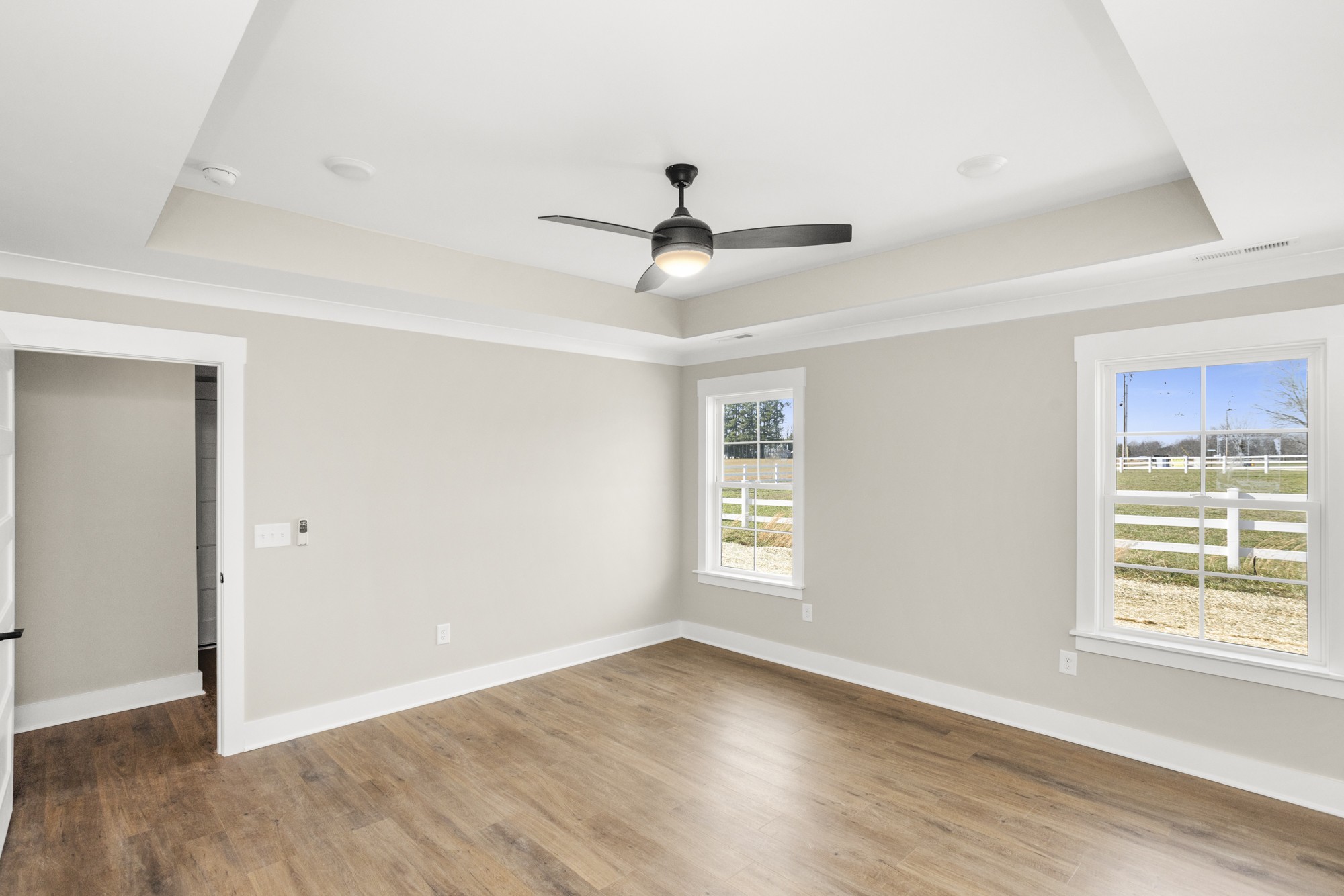 381 Copperas Creek Road Tullahoma, TN 37388 - Photo 26 of 44 a view of empty room with wooden floor and fan