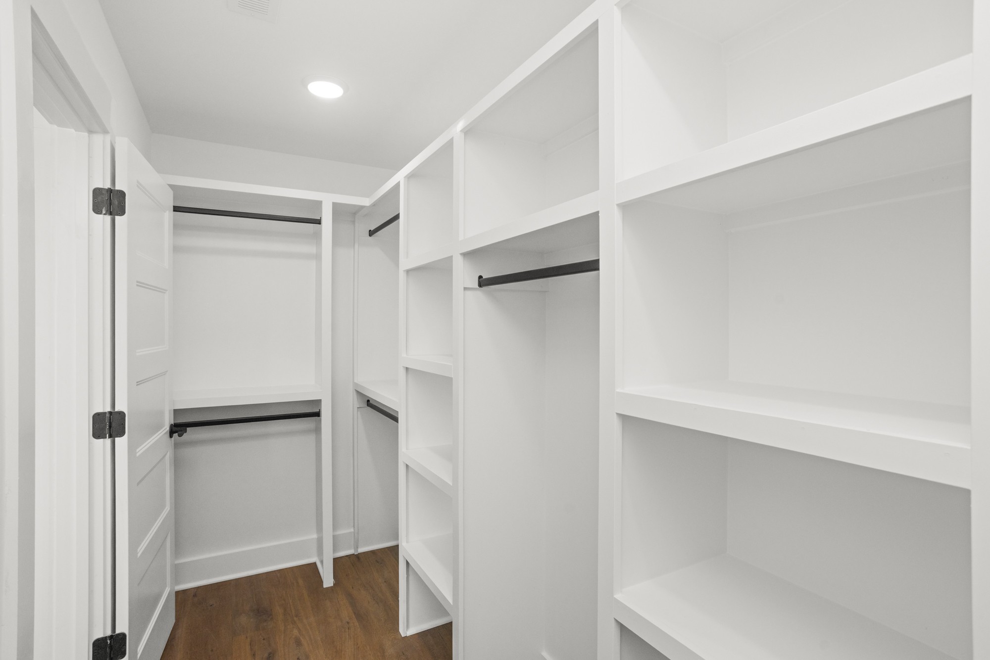 381 Copperas Creek Road Tullahoma, TN 37388 - Photo 33 of 44 a view of walk in closet with wooden floor