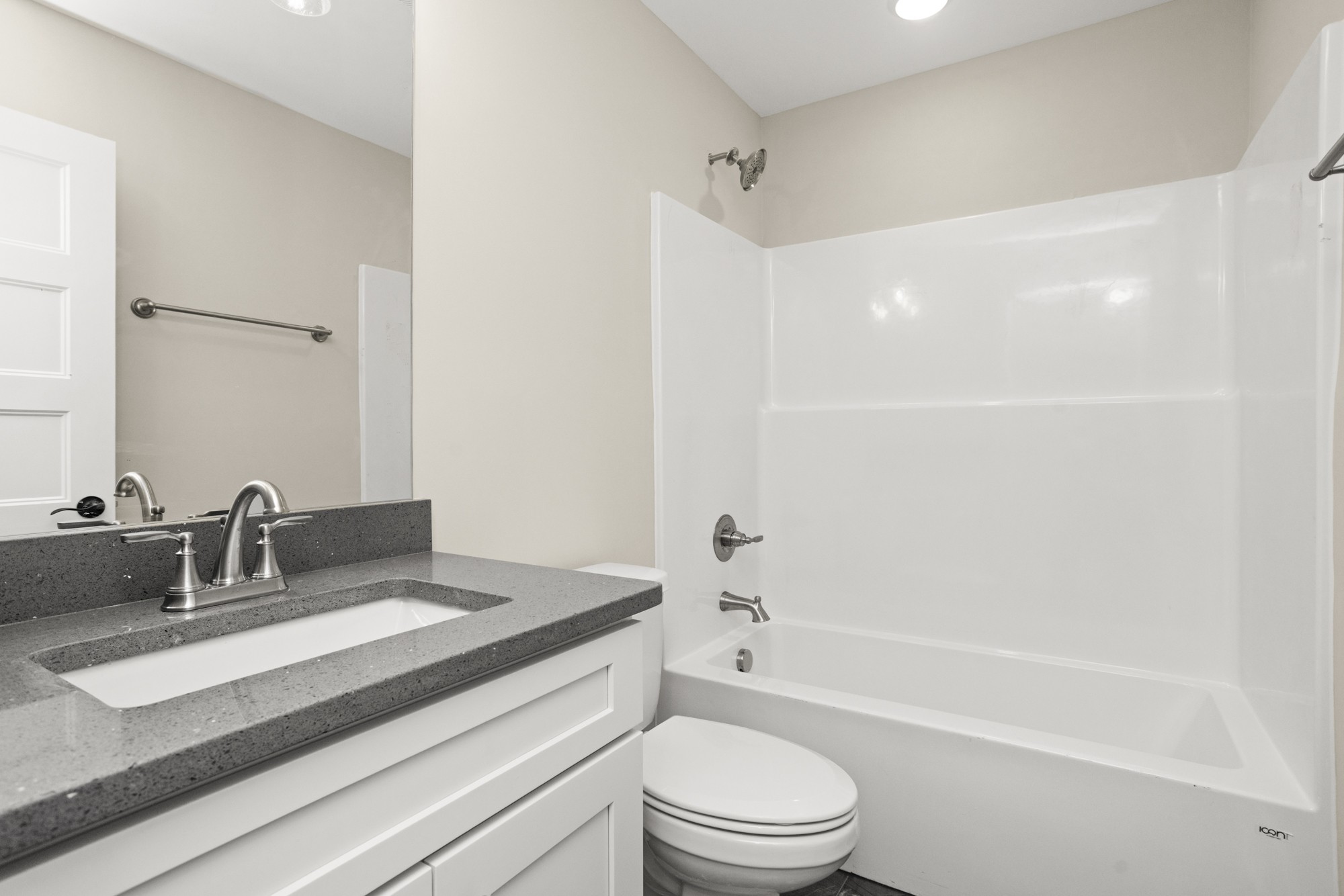 381 Copperas Creek Road Tullahoma, TN 37388 - Photo 40 of 44 a bathroom with a sink a toilet a mirror and shower