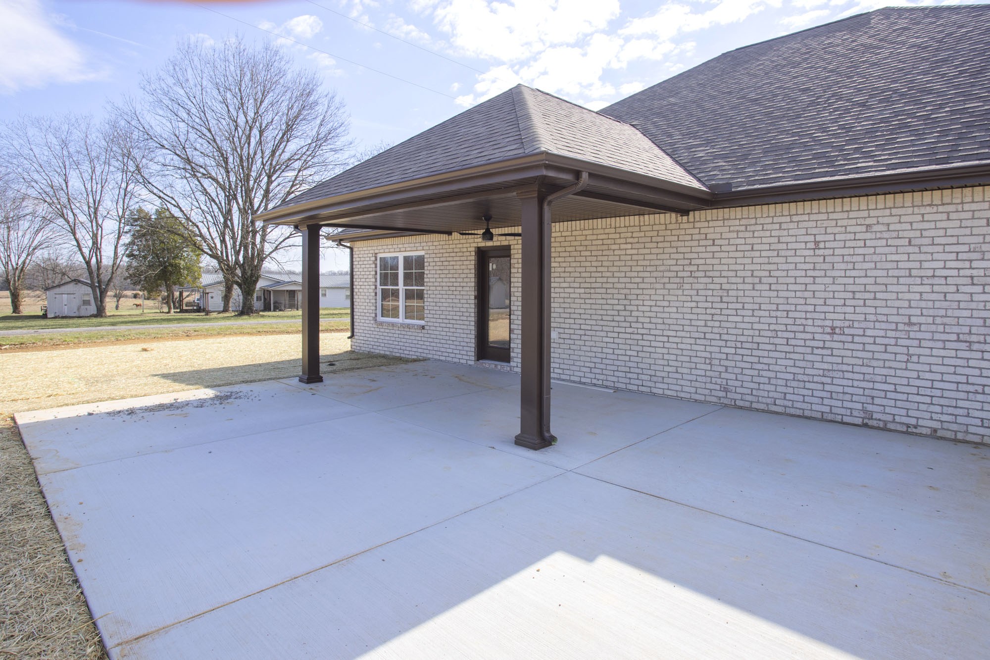 381 Copperas Creek Road Tullahoma, TN 37388 - Photo 41 of 44 a view of a house with backyard and tree