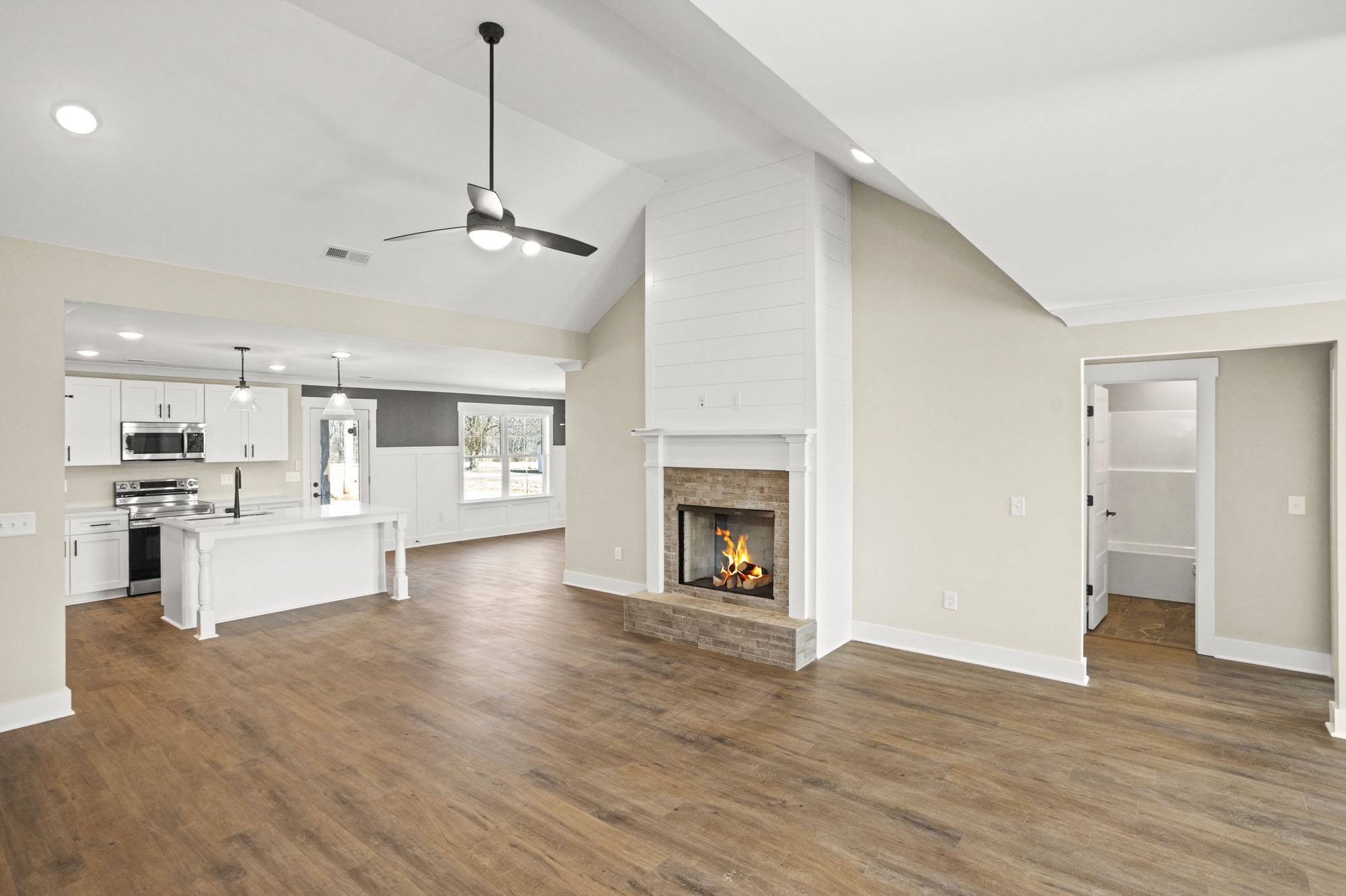 381 Copperas Creek Road Tullahoma, TN 37388 - Photo 6 of 44 a view of kitchen with cabinets and wooden floor