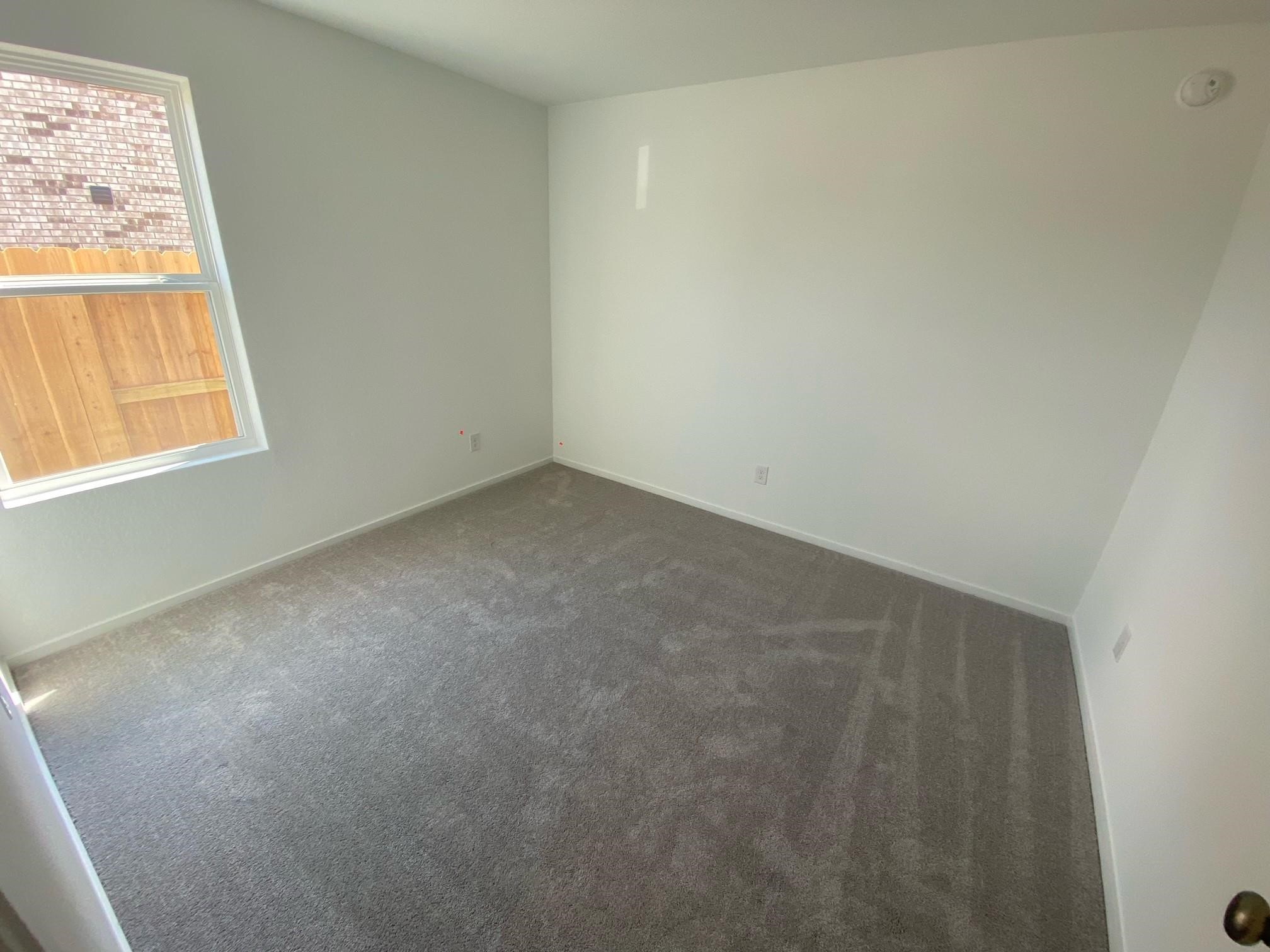 6084 Butler Ridge Drive College Station, TX 77840 - Photo 8 of 12 an empty room with a window