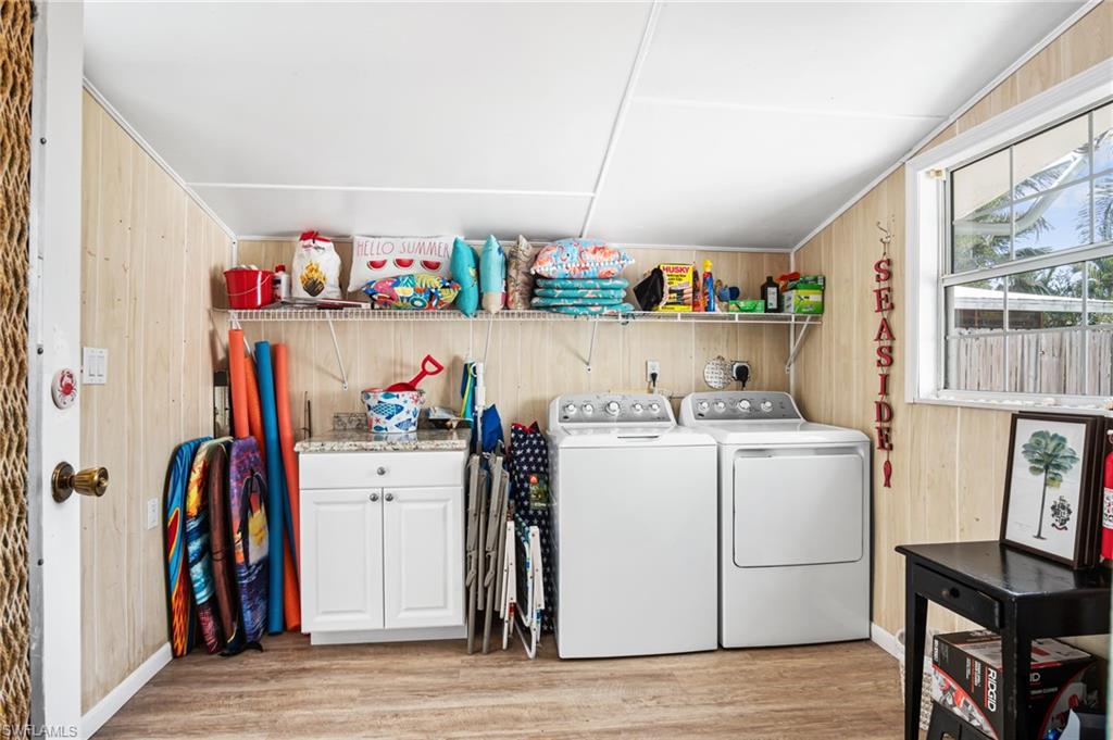 1097 Sperling Avenue Naples, FL 34103 - Photo 29 of 37 a storage room with washer and dryer