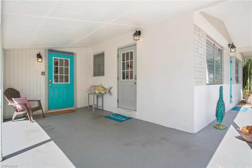 1097 Sperling Avenue Naples, FL 34103 - Photo 30 of 37 a living room with furniture