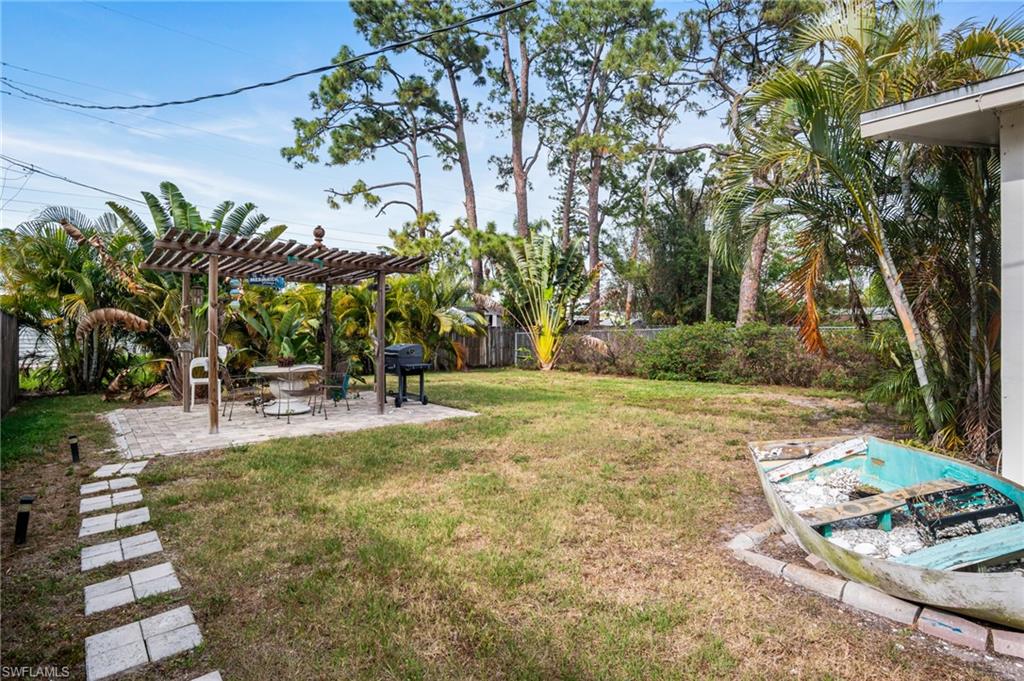 1097 Sperling Avenue Naples, FL 34103 - Photo 31 of 37 a view of a yard with plants