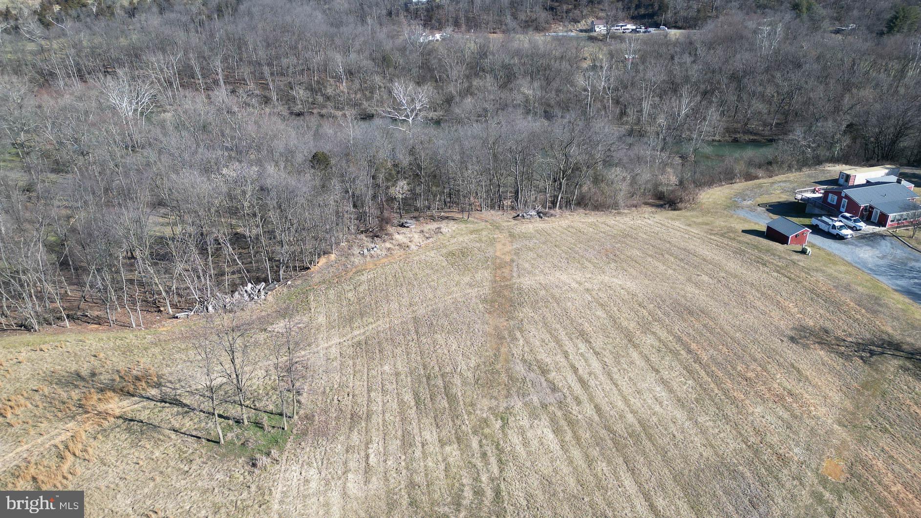 16218 Broadfording Road Hagerstown, MD 21740 - Photo 23 of 27 a view of empty room and trees
