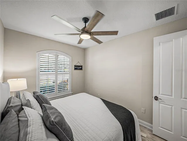an aerial view of a house with a swimming pool yard and outdoor seating